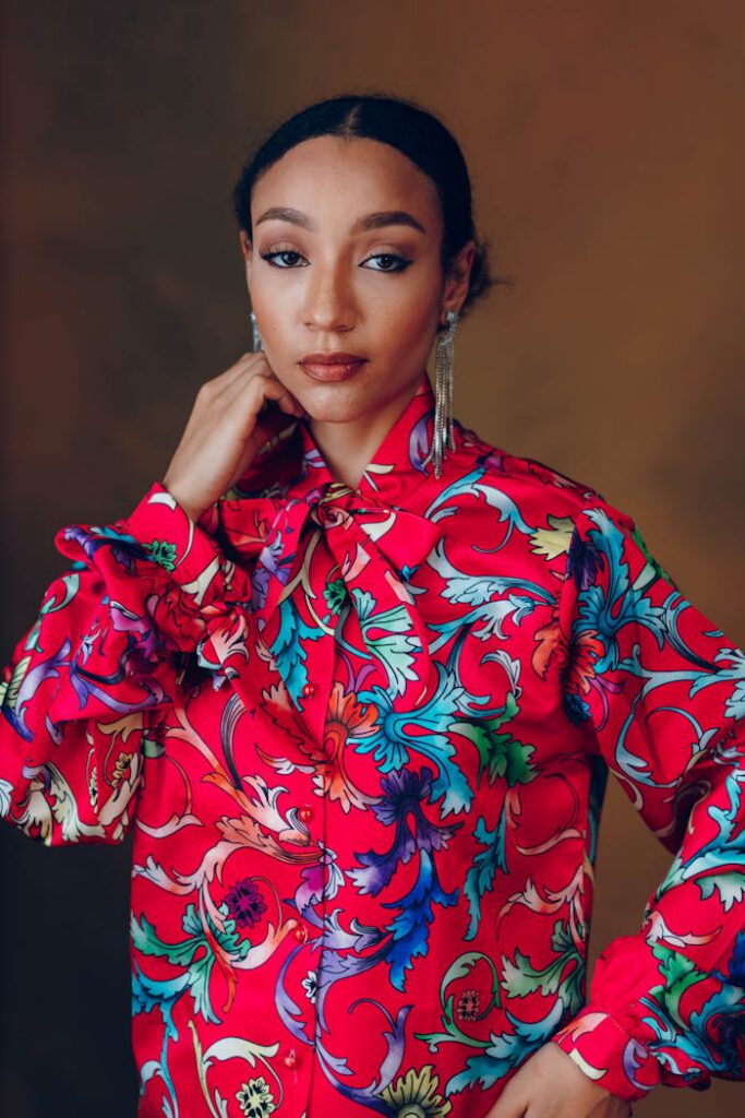 Stylish portrait of a confident woman in vibrant fashion capturing elegance and poise.